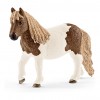 Конюх с шотладским пони 42362 Schleich